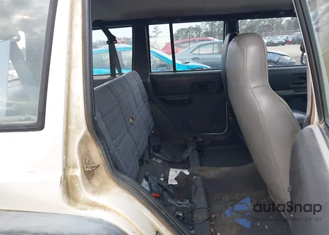 1999 Jeep Cherokee Rhd Rural Letter Carrier z USA, uszkodzony, nr VIN 1J4FB28S6XL610302